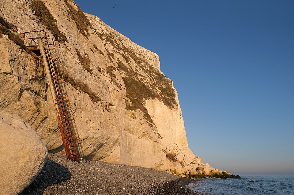 The chalk White Cliffs of Dover in evening light